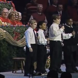 Four boys singing in church is the funniest thing I’ve seen. Keep your eyes on the boy in the vest